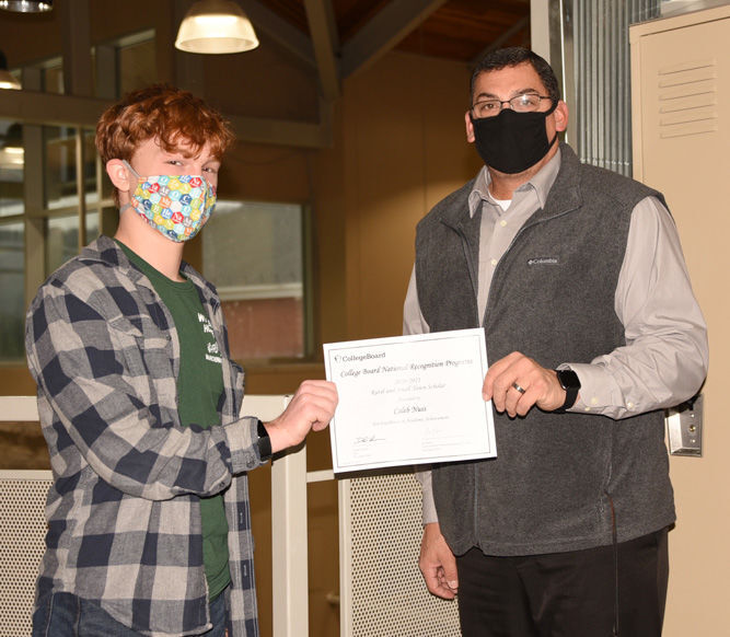 Earns scholastic honors